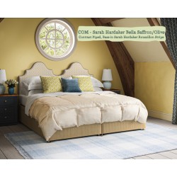 Headboard in Sarah Hardaker Bella Saffron Olive, Piped in Harbour Marine, Base in Sarah Hardaker Roussillon Stripe Saffron.