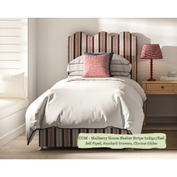 Solas Coll Bed shown in Mulberry Home Shelter Stripe Indigo/Red, Self Piped with Chrome Glides and Standard Drawers.