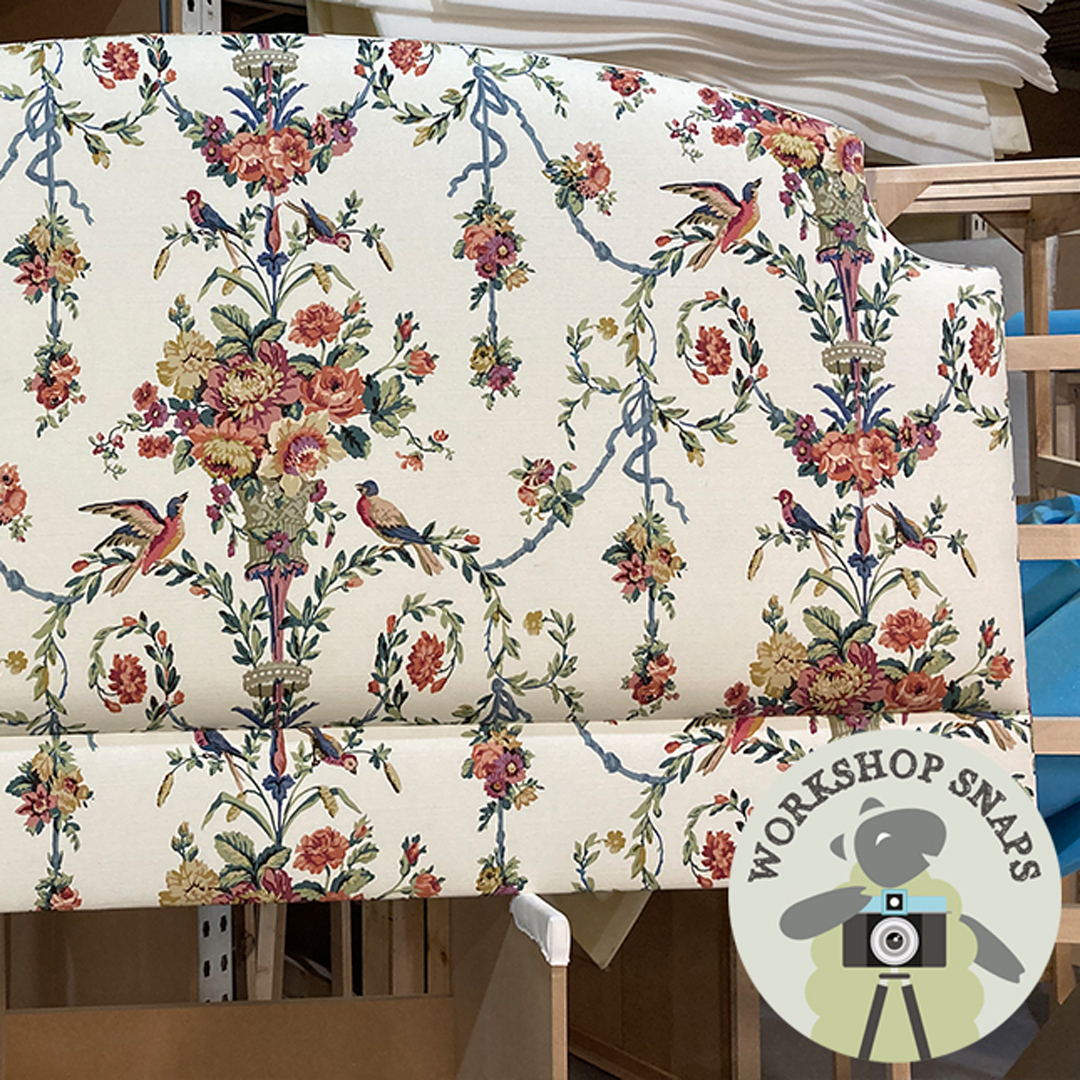 Eigg Keystone Shape Curved Bed upholstered in Manuel Canovas with a Romo Fringe