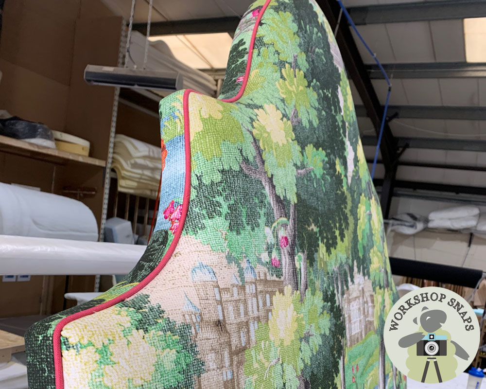 Eigg Keystone Shape Curved Bed upholstered in Manuel Canovas with a Romo Fringe