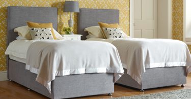 The Clever and Practical Coll Zip & Link Bed with removable cover, covered in House Weave Light Grey